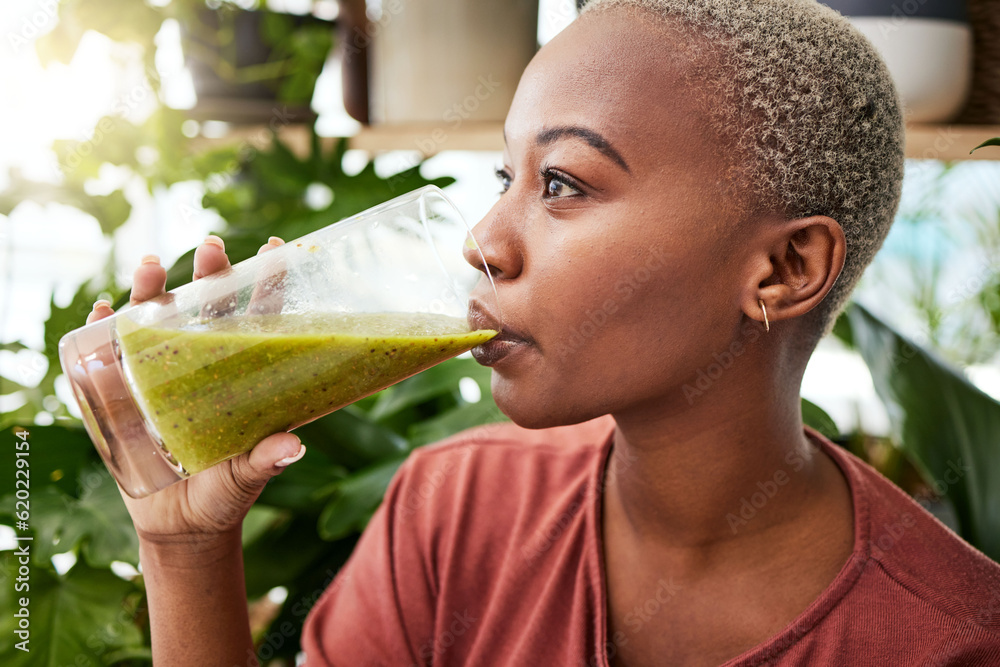 Black woman, diet and drinking natural smoothie for vitamins, fiber or health and wellness in store.