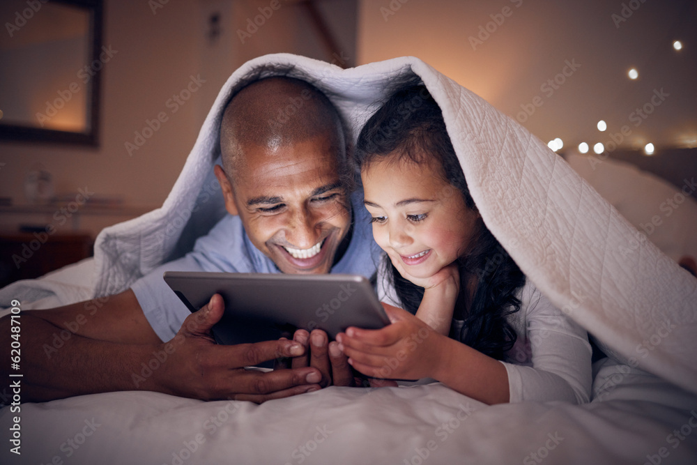Father, kid and smile with tablet at night under blanket of online games, reading ebook or storytell