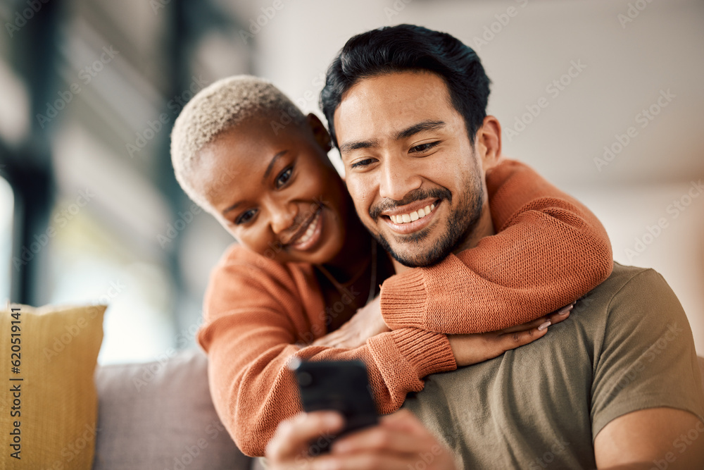 Phone, interracial couple and technology on a sofa at home reading text in a living room. Support, y
