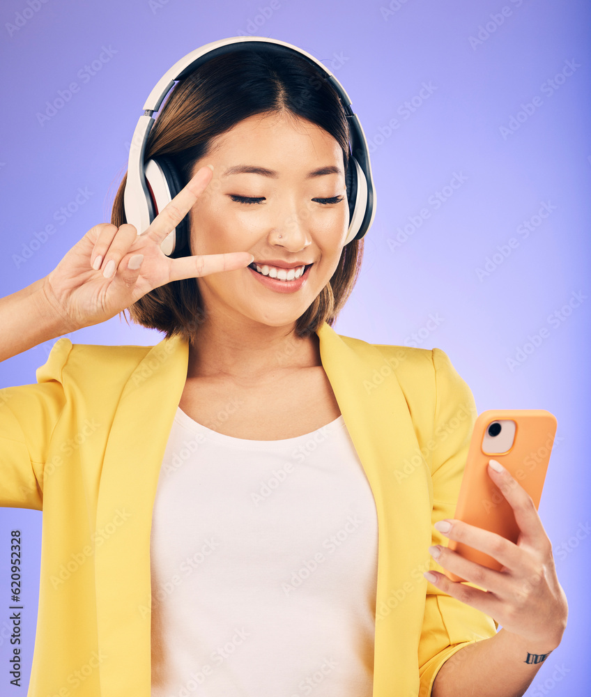 Peace sign, selfie and happy Asian woman in studio smile for social media, online post or mobile app