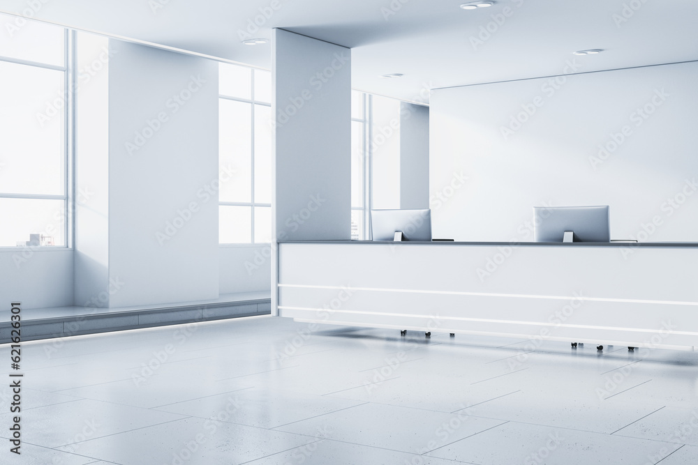 Clean white concrete office lobby interior with reception desk and computer, window with city view a