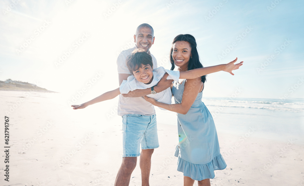 Adventure, beach and parents holding their kid on the sand by the ocean on a family vacation. Happy,