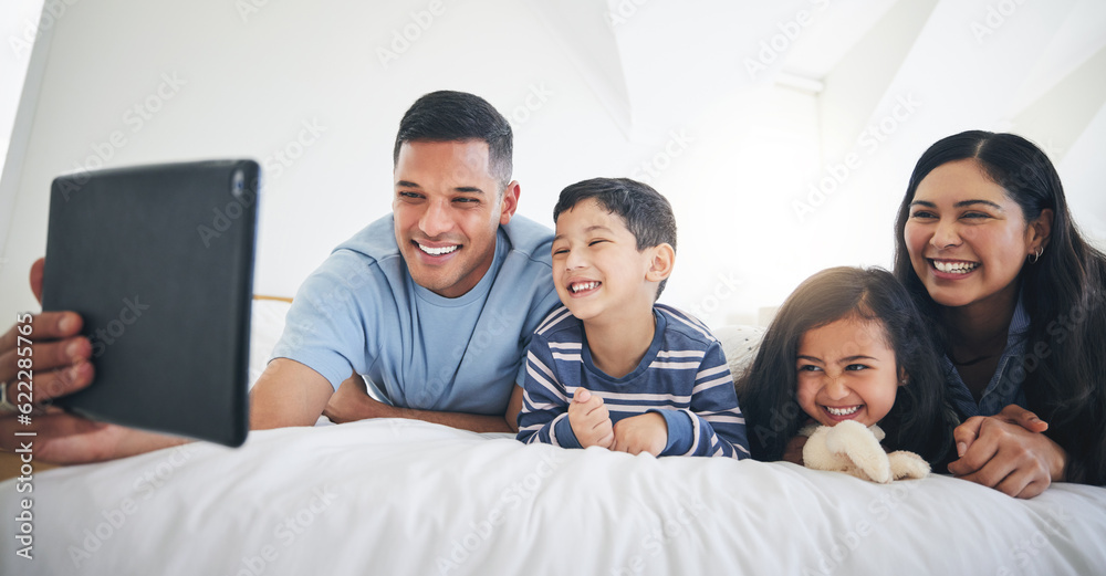 Digital tablet, video call and happy family in bed relax, smile and bond with online communication. 