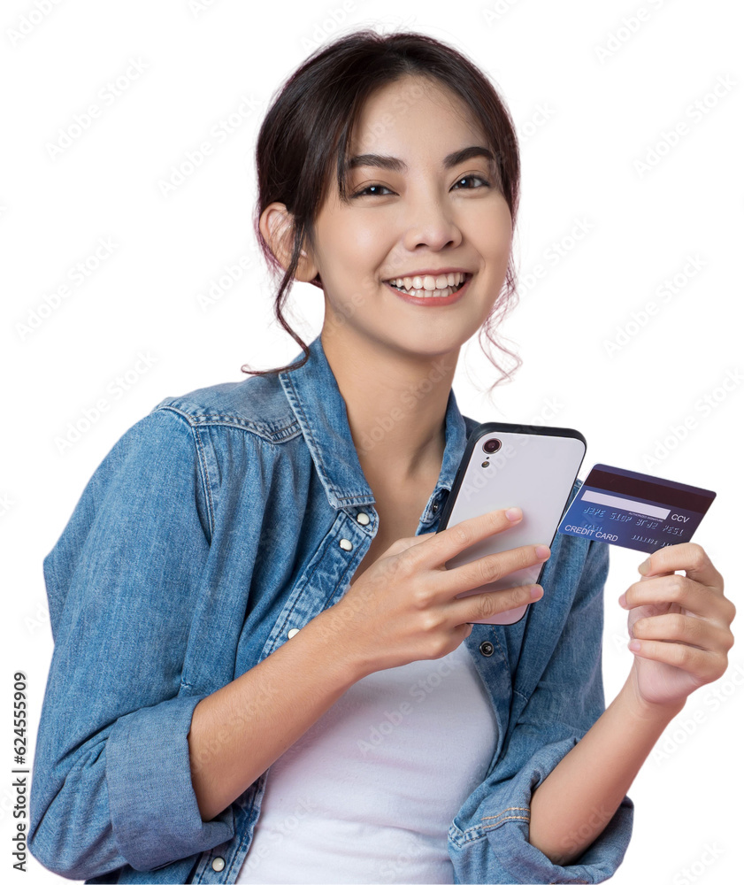 Young beauty Asian woman shopping payment online with credit card on smartphone and she wearing jean