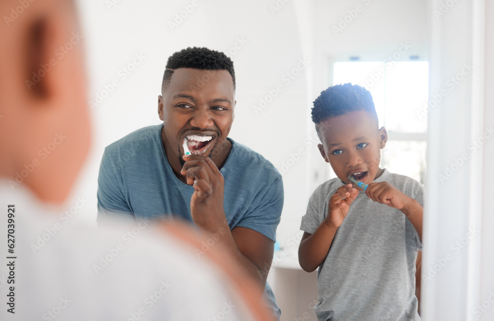 Black man brushing his teeth with his kid for dental hygiene, health and wellness in the bathroom. O