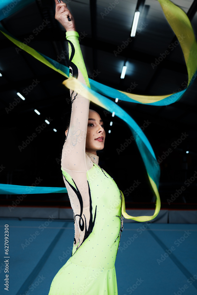 Ribbon, dance and rhythmic gymnastics, woman in gym with action and performance for fitness. Competi
