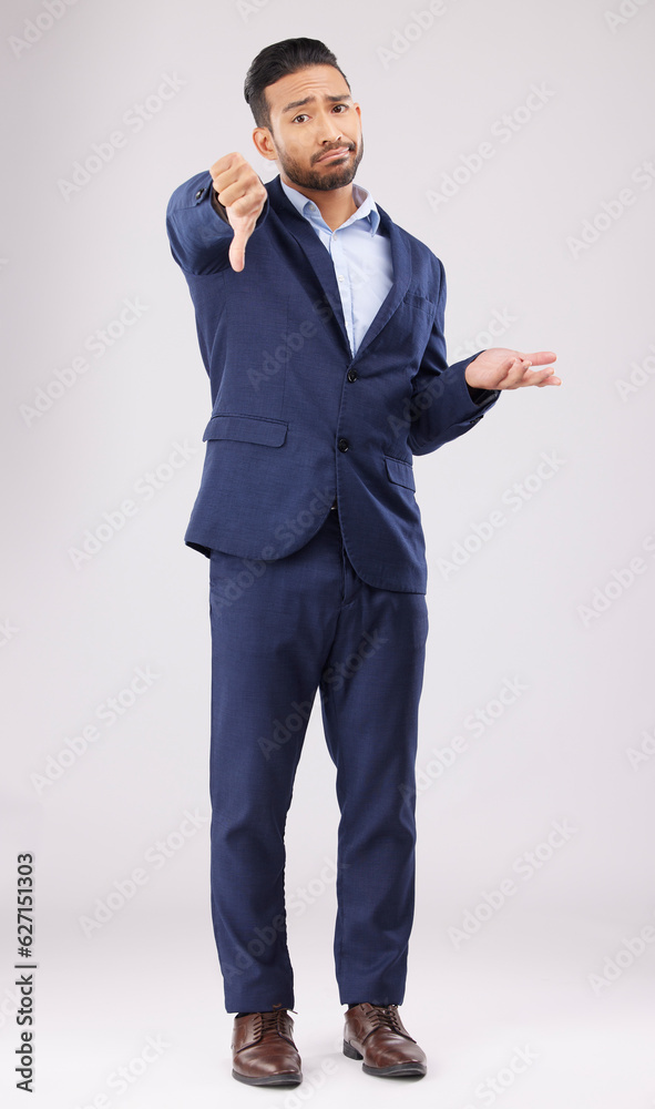 Portrait, thumbs down and confused business man with negative fail sign, no opinion or decision disa