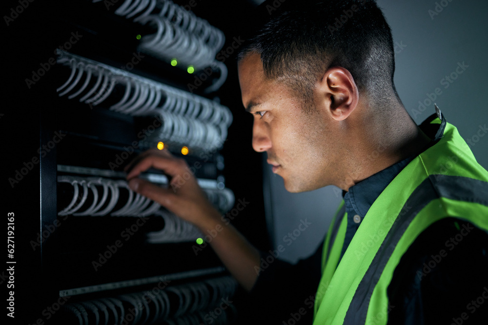Technician man, server room and inspection for cables, thinking and focus for analysis, night and pr