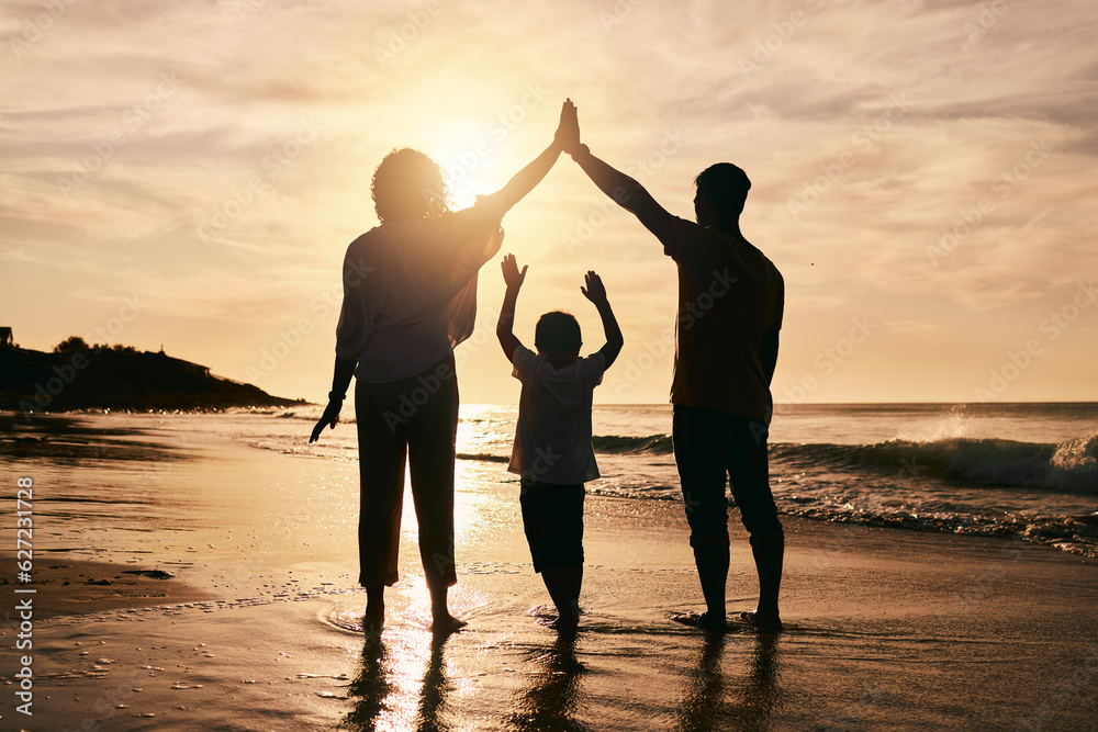 Silhouette, family and protection, beach at sunset with parents and child, safety and ocean waves. B