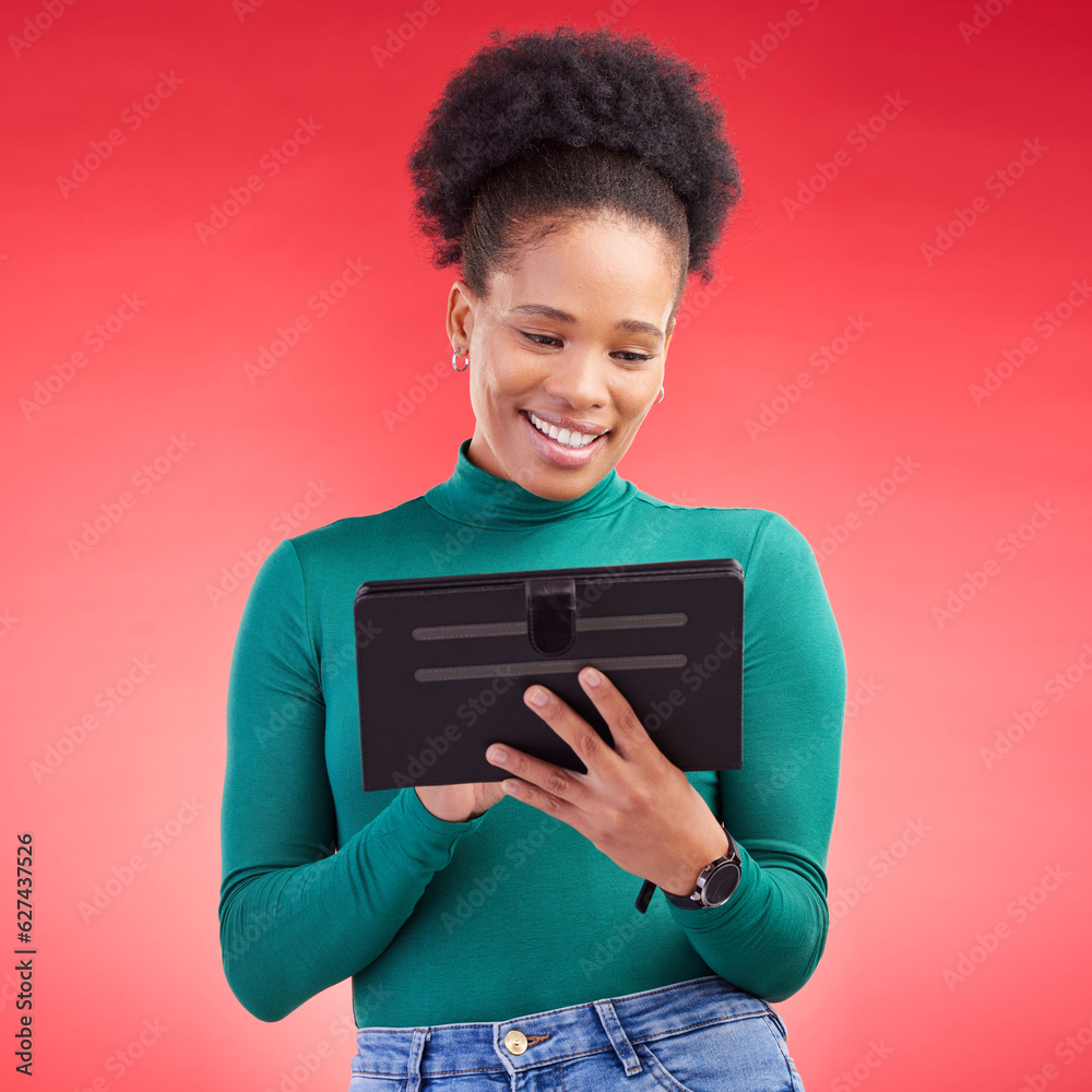Happy woman, tablet and research for social media or communication against a red studio background. 