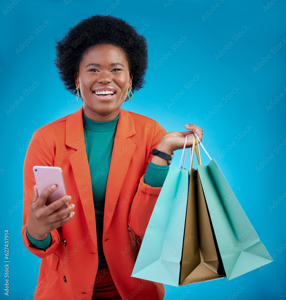 Shopping bag, phone and happy woman for e commerce sale, discount or social media on blue background