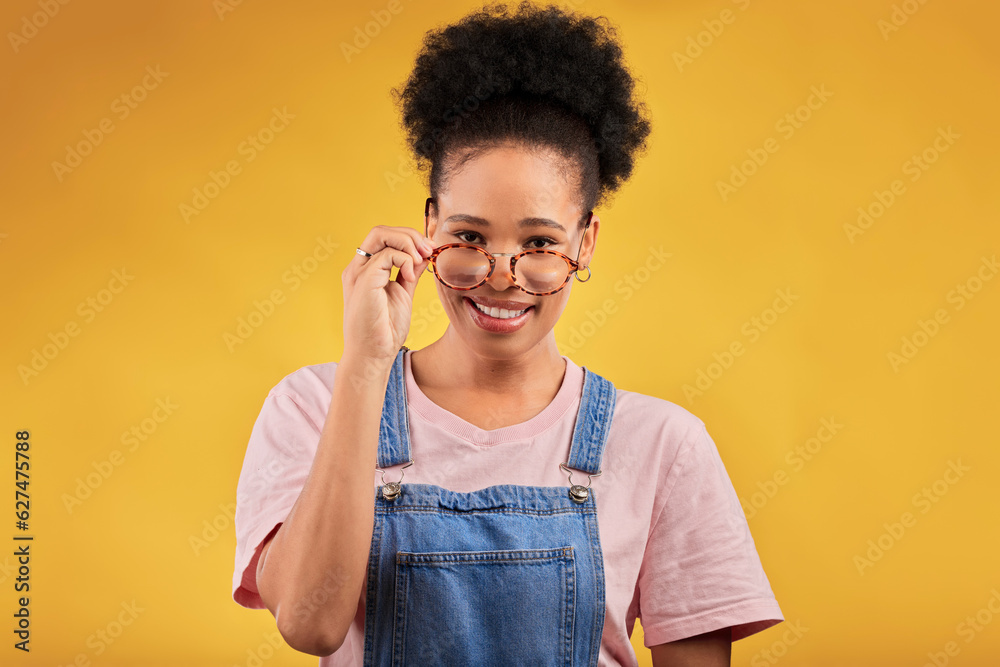 Portrait, glasses and happy with a black woman on a yellow background in studio for vision. Fashion,