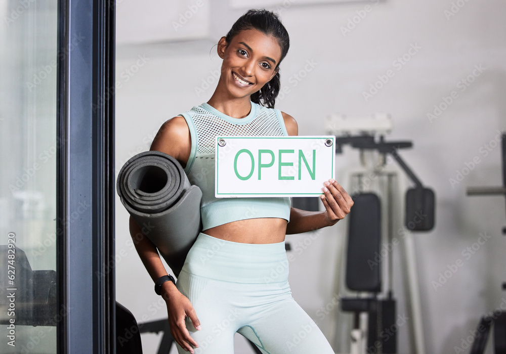 Happy woman, portrait or personal trainer at gym with an open sign for workout exercises or training