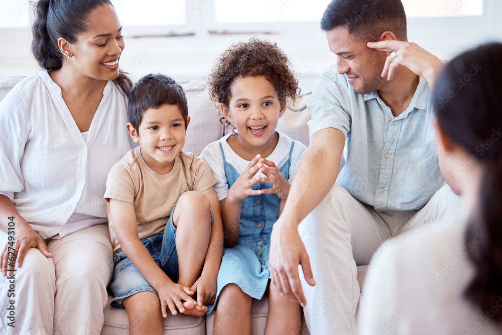 Parents, kids and counselling with psychology, smile and together on sofa, support and discussion. Y