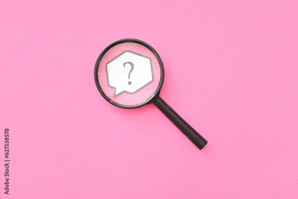 Speech bubble with question mark and magnifier on pink background