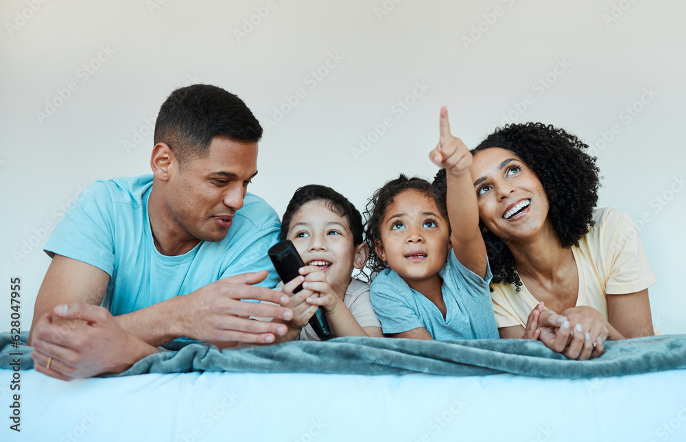 Father, mom and kids on bed, watching tv and smile for comedy, funny movie or pointing in family hom
