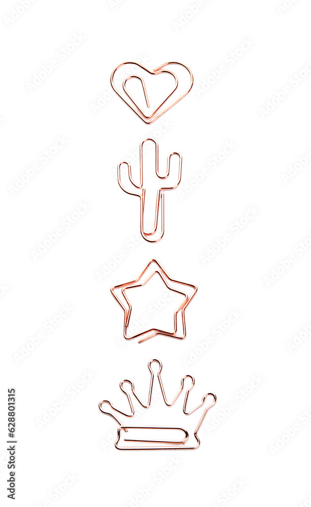 Rose gold paper clips in different shapes on white background
