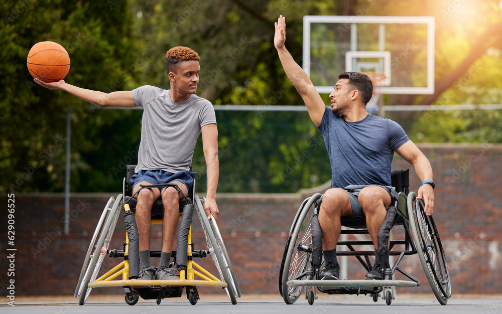 Sports, basketball and men in wheelchair on court for training, exercise and workout on outdoor park