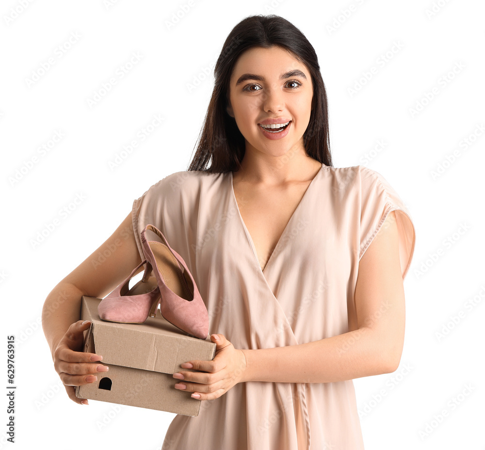 Young woman with shoe box on white background