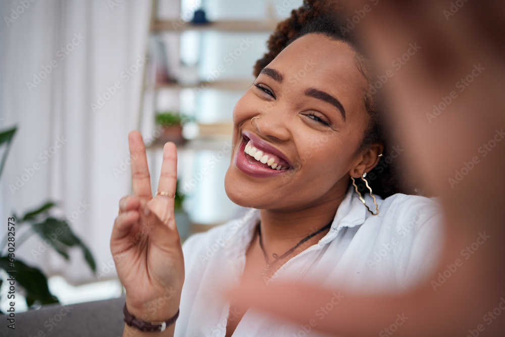 Happy woman, portrait and peace sign for selfie, photography or social media and blog post at home. 