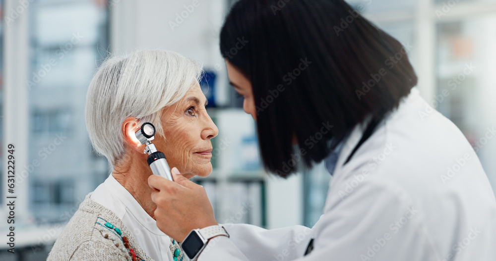 Senior woman, doctor and otoscope for ear, hearing test and exam, audio check or consultation for he