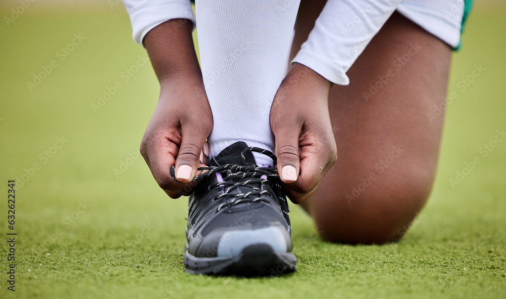 Lace shoes, sports person and field for training, performance or workout on grass turf. Closeup hand