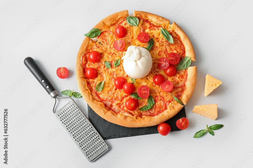 Board of tasty pizza with Burrata cheese on grey background