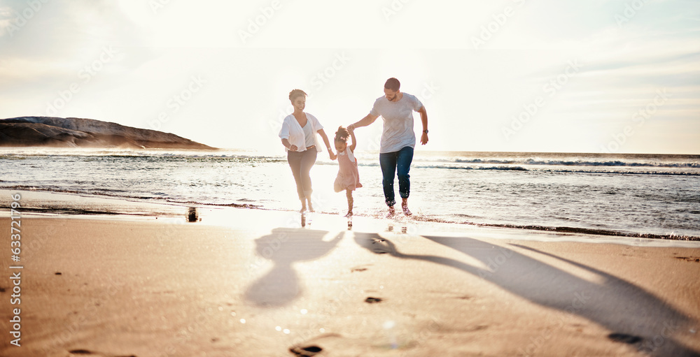 Beach, sunset and child with her mother and father on a vacation, adventure or holiday together for 