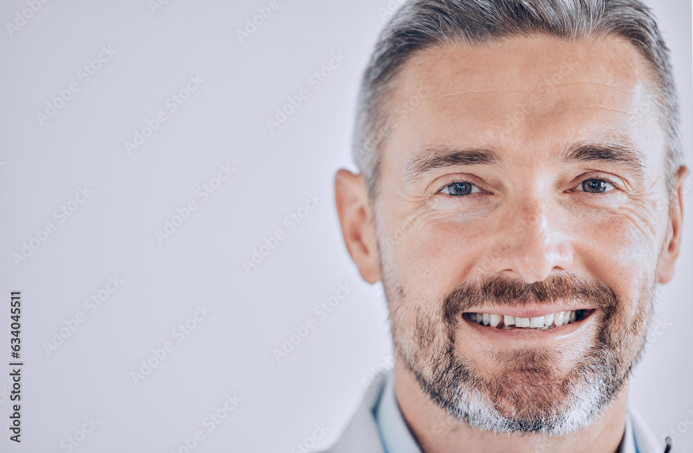 Doctor man, headshot and space with smile in portrait, mockup or promotion for hospital employee. He