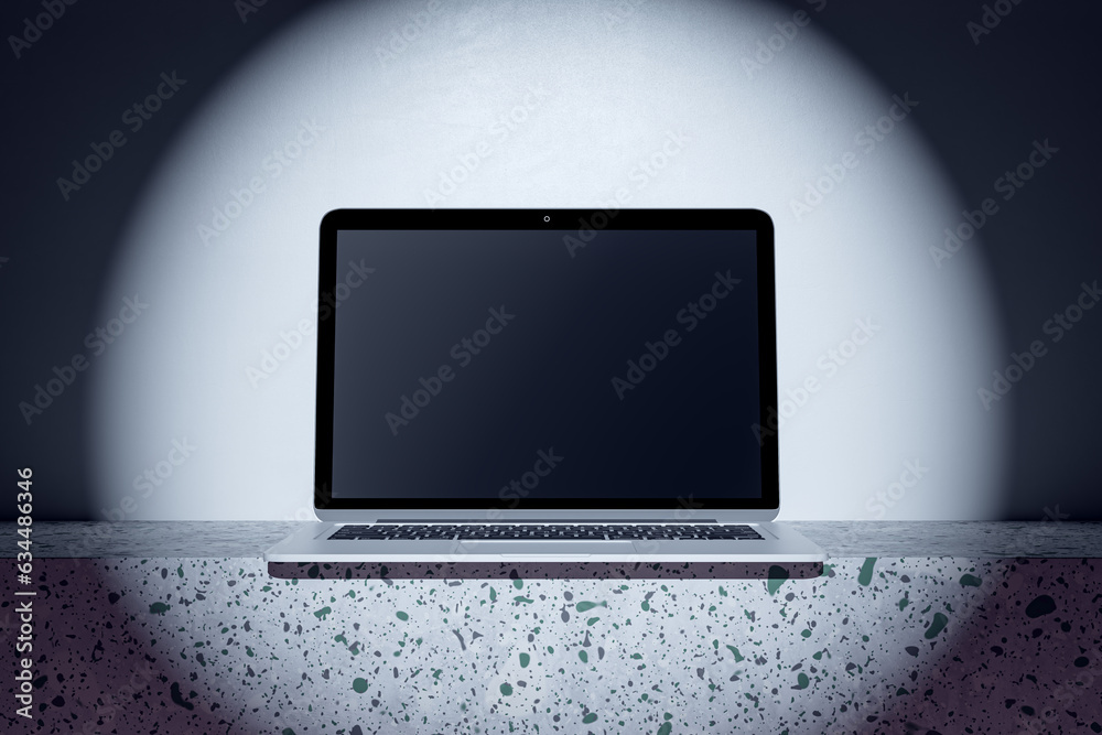 Close up of empty computer monitor in spotlight. Mock up place and advertisement concept. 3D Renderi