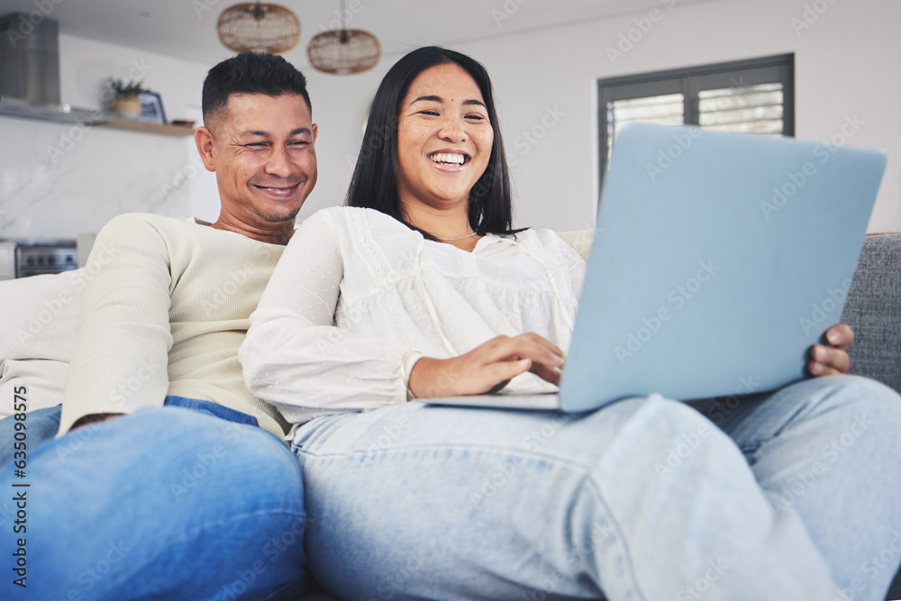 Smile, laptop and couple networking on a sofa to relax in the living room of their modern house. Hap
