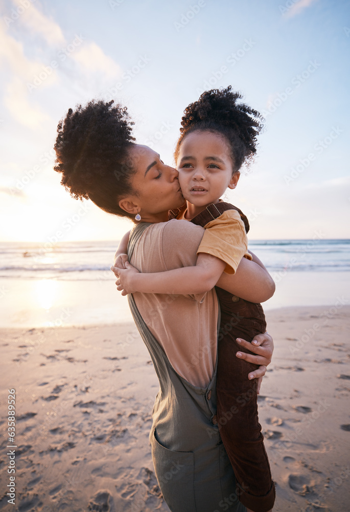 Beach, sunset and mother kissing her child on a family vacation, holiday or travel adventure. Love, 
