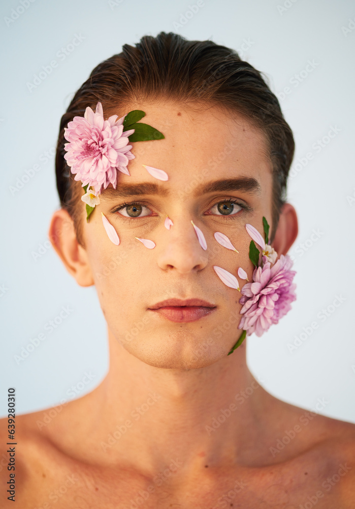 Floral, skincare and flowers with portrait of man in studio for beauty, natural cosmetics and creati