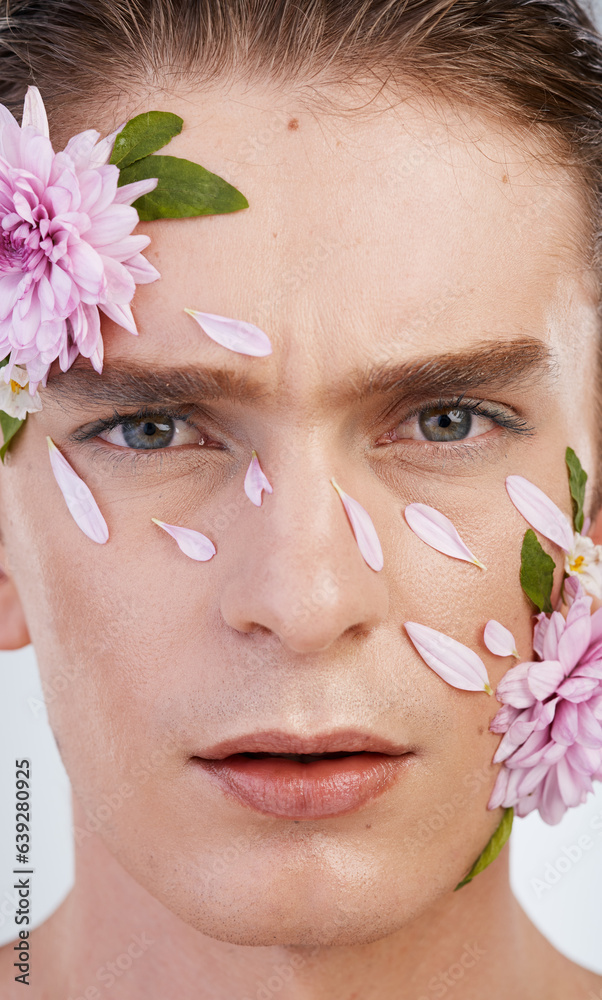 Cosmetics, skincare and flowers with portrait of man in studio for beauty, natural and creative. Glo