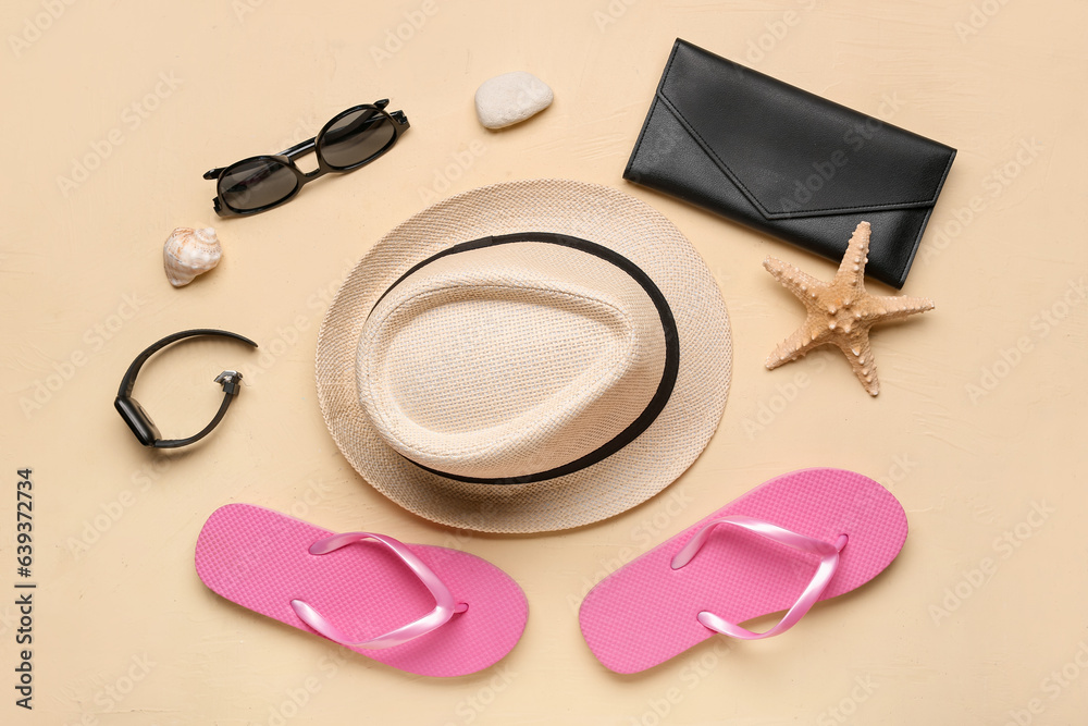 Composition with beach accessories and smart watch on color background