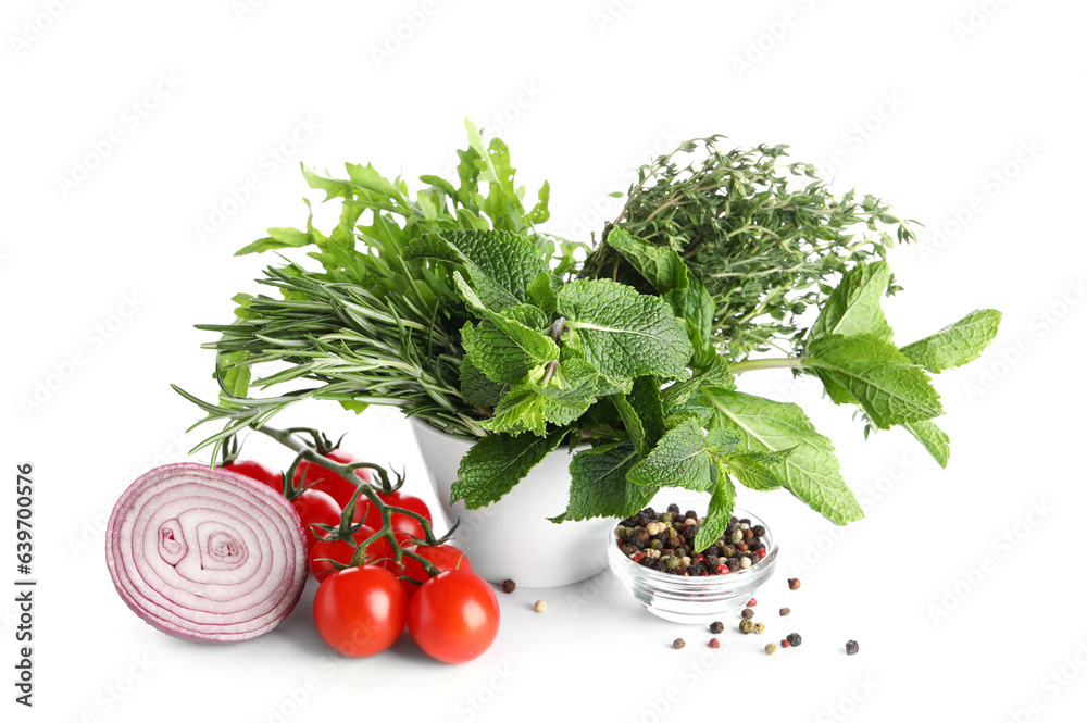 Fresh herbs, spices and vegetables isolated on white background