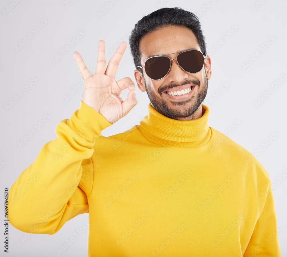 Fashion, happy and man with okay sign on a white background for approval, agreement and yes. Emoji, 