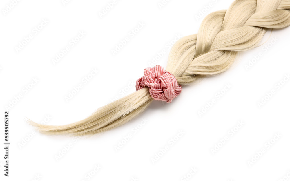 Braided strand with scrunchy on white background, closeup