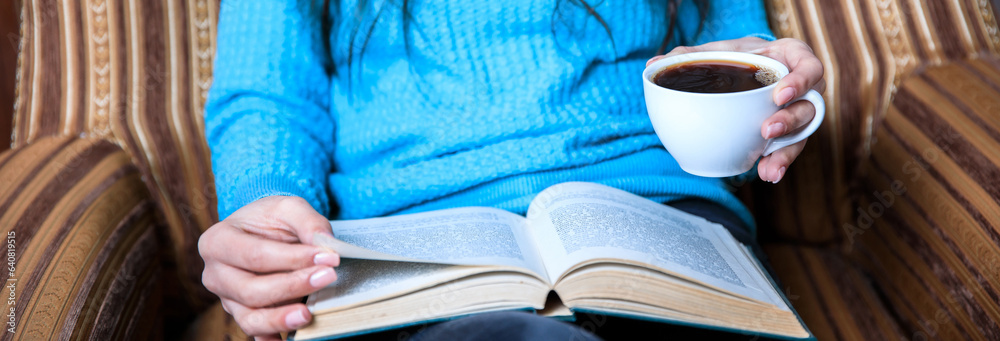 woman hand coffee and book