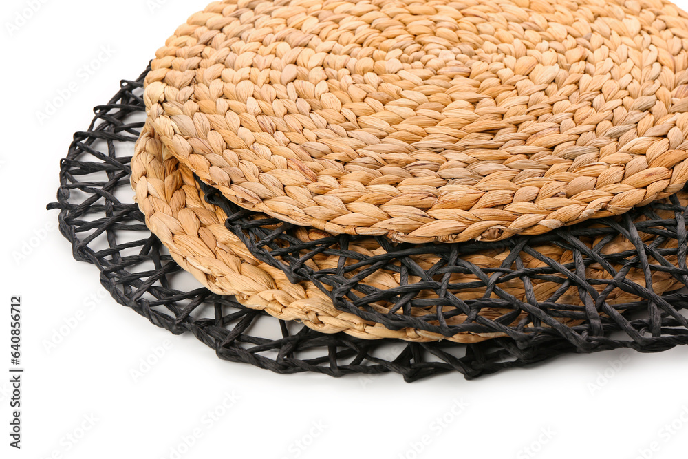 Set of wicker mats isolated on white background, closeup