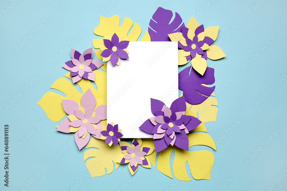 Blank card with colorful origami flowers and leaves on light blue background