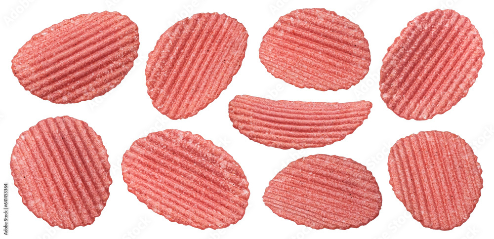 Falling red ridged beetroot chips isolated on white background