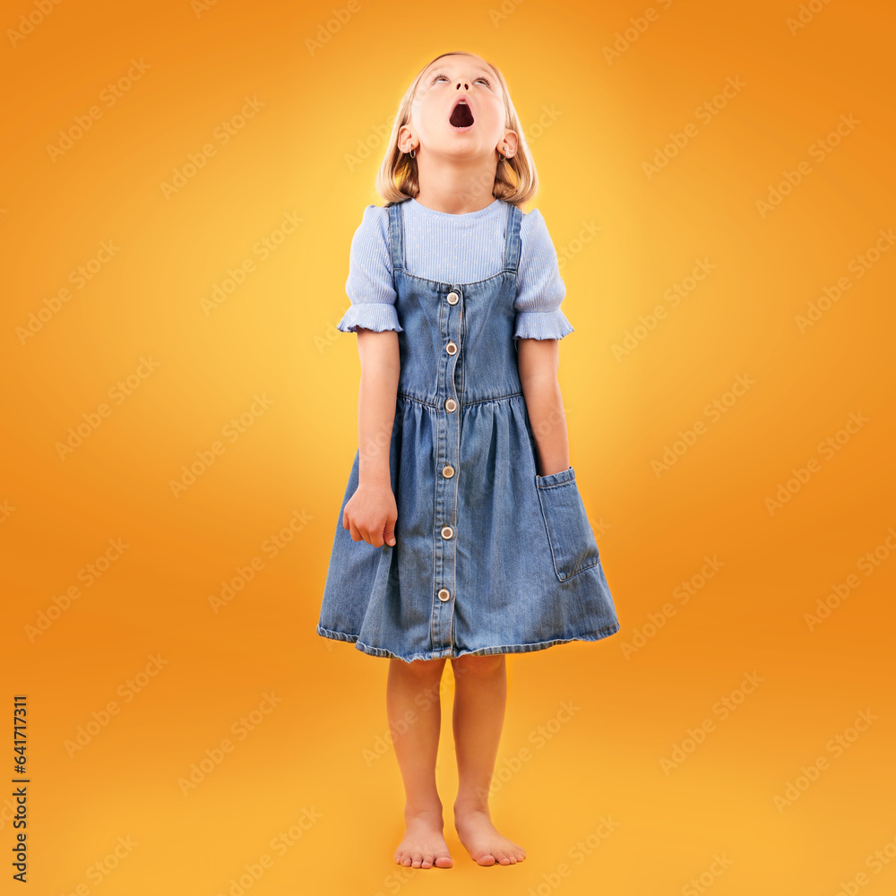 Fashion, wow and girl child in studio for news, omg or coming soon promotion on orange background. L