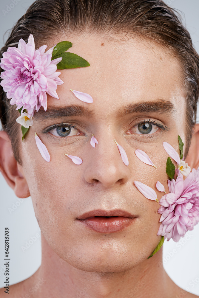 Natural, skincare and flowers with portrait of man in studio for spring, beauty cosmetics and creati
