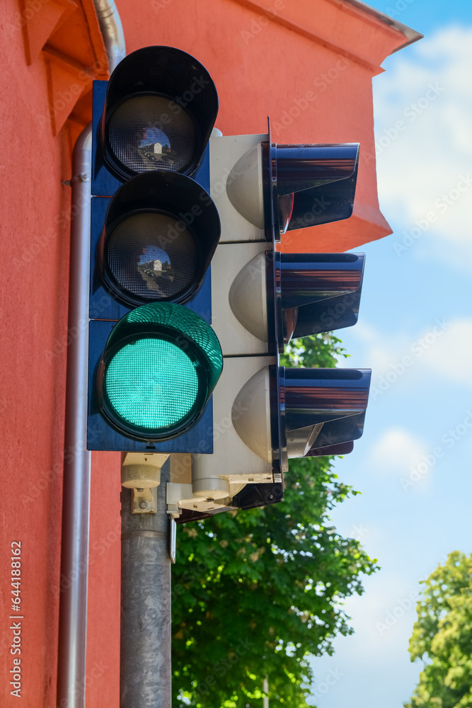 View of green traffic light in city, closeup
