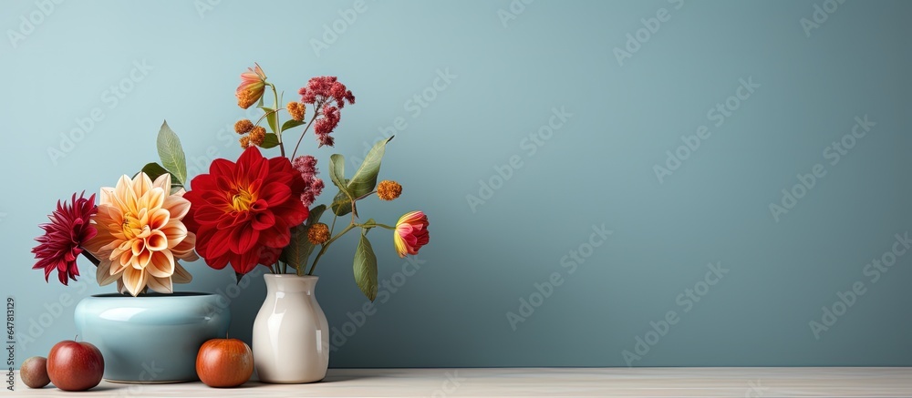Flowers in a vase on a shelf