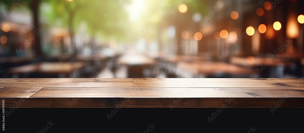 Dark wooden table in caf or coffee shop for product display or montage