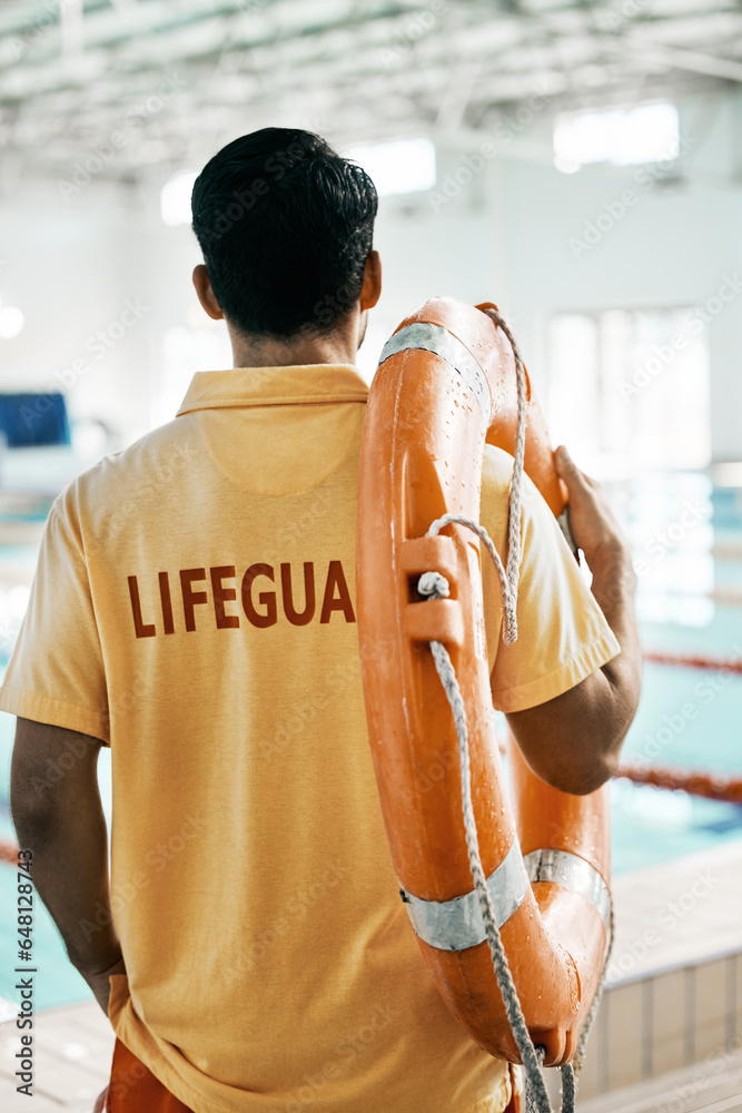Swimming pool lifeguard and person with lifebuoy safety equipment and watch for rescue support, help or service. Surveillance, attention and back of expert for emergency assistance for public danger