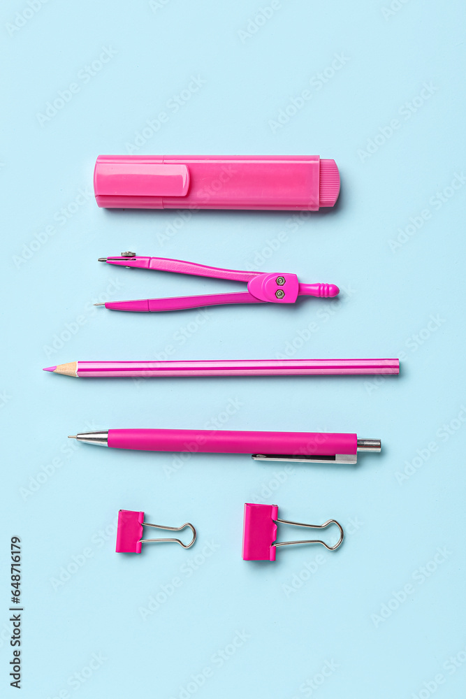 Composition with pink stationery on color background