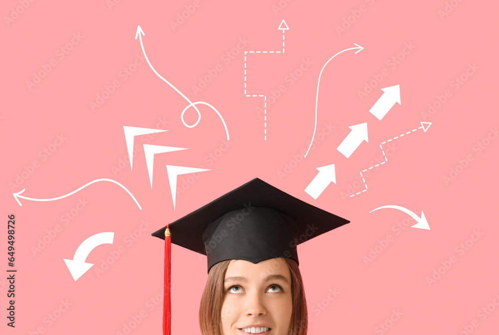 Female graduating student and many arrows on pink background. Concept of choice